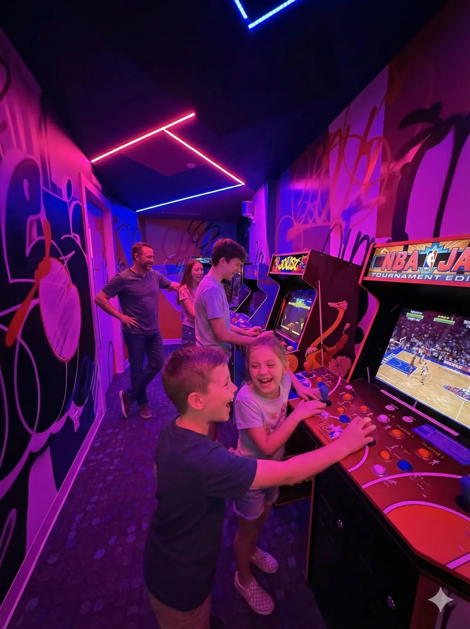 Family enjoying classic arcade games at Hy's Arcade